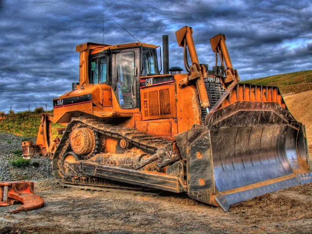 Caterpillar bulldozer staged at a clean-fill site